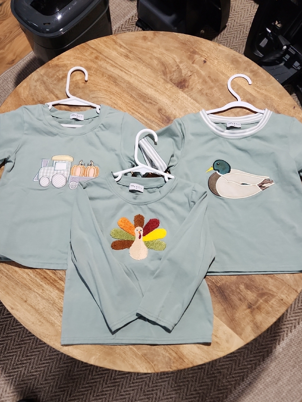 Abby & Evie Three Sage Green Kids Shirts with Whimsical Appliqués